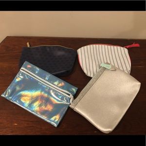 Pack of blue Ipsy bags